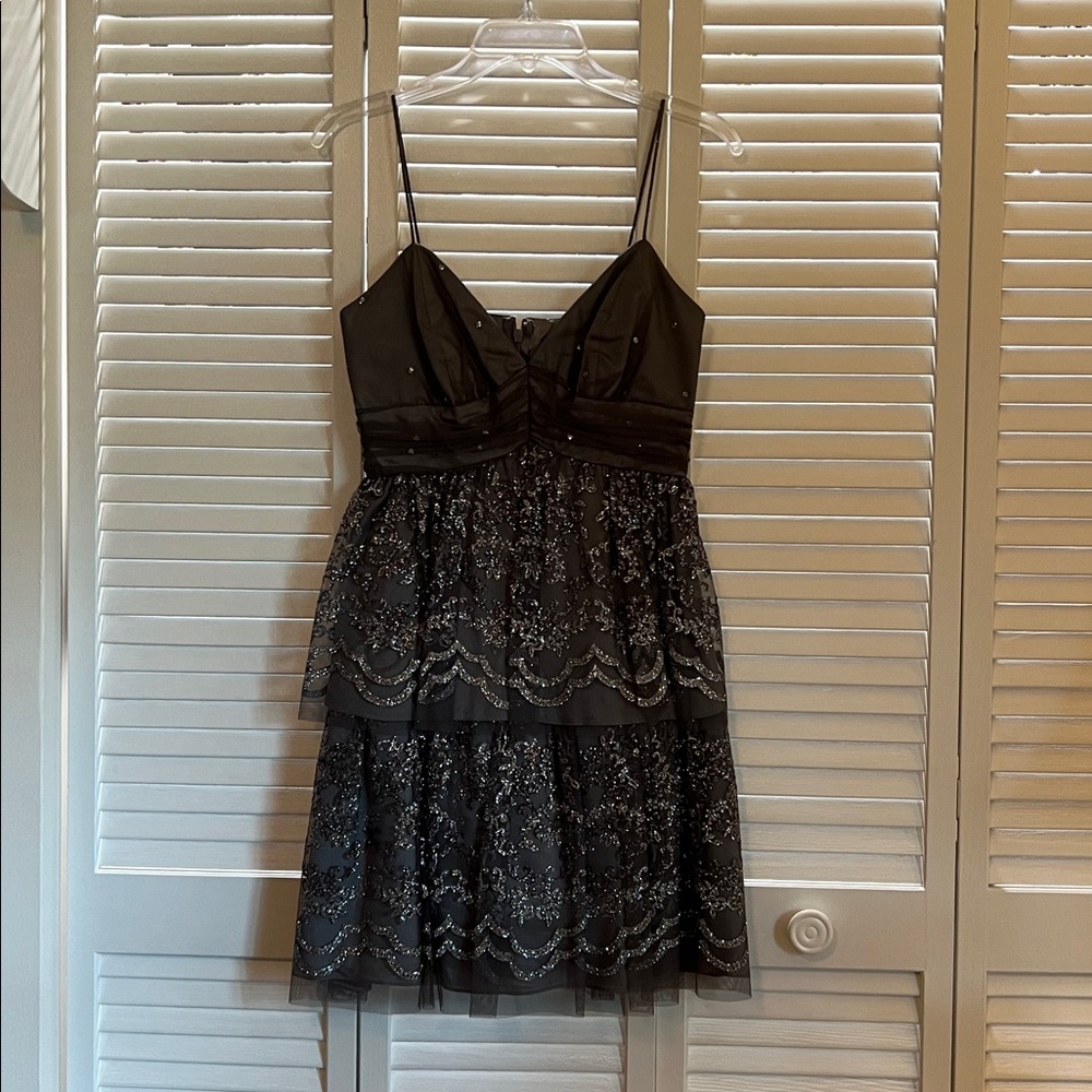 Silver embellished tiered cocktail dress with spaghetti straps